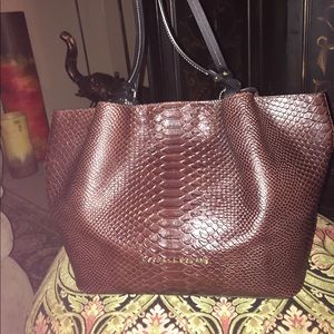 Beautiful Dooney and Bourke’s snake skin handbag